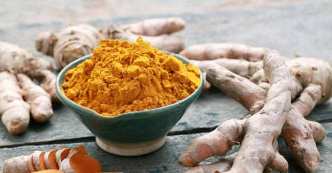 1585125624-h-250-turmeric-powder-and-root-on-wooden-table-large.jpg
